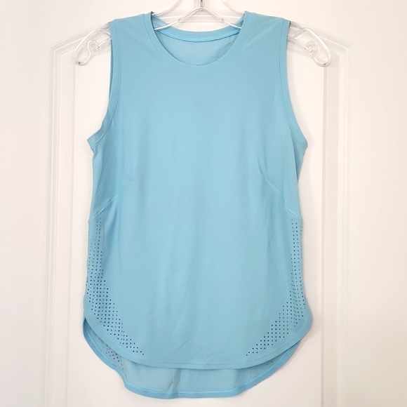 lululemon athletica Tops - Beautiful Lululemon sky blue top in excellent condition!